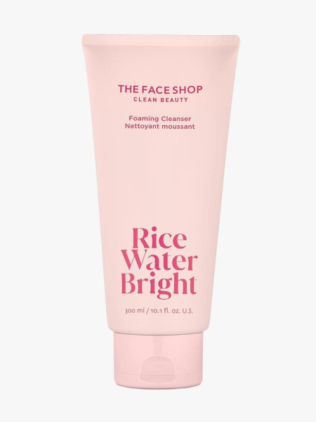 The Face Shop Rice Water Bright Facial Foaming Cleanser light pink tube on light gray background